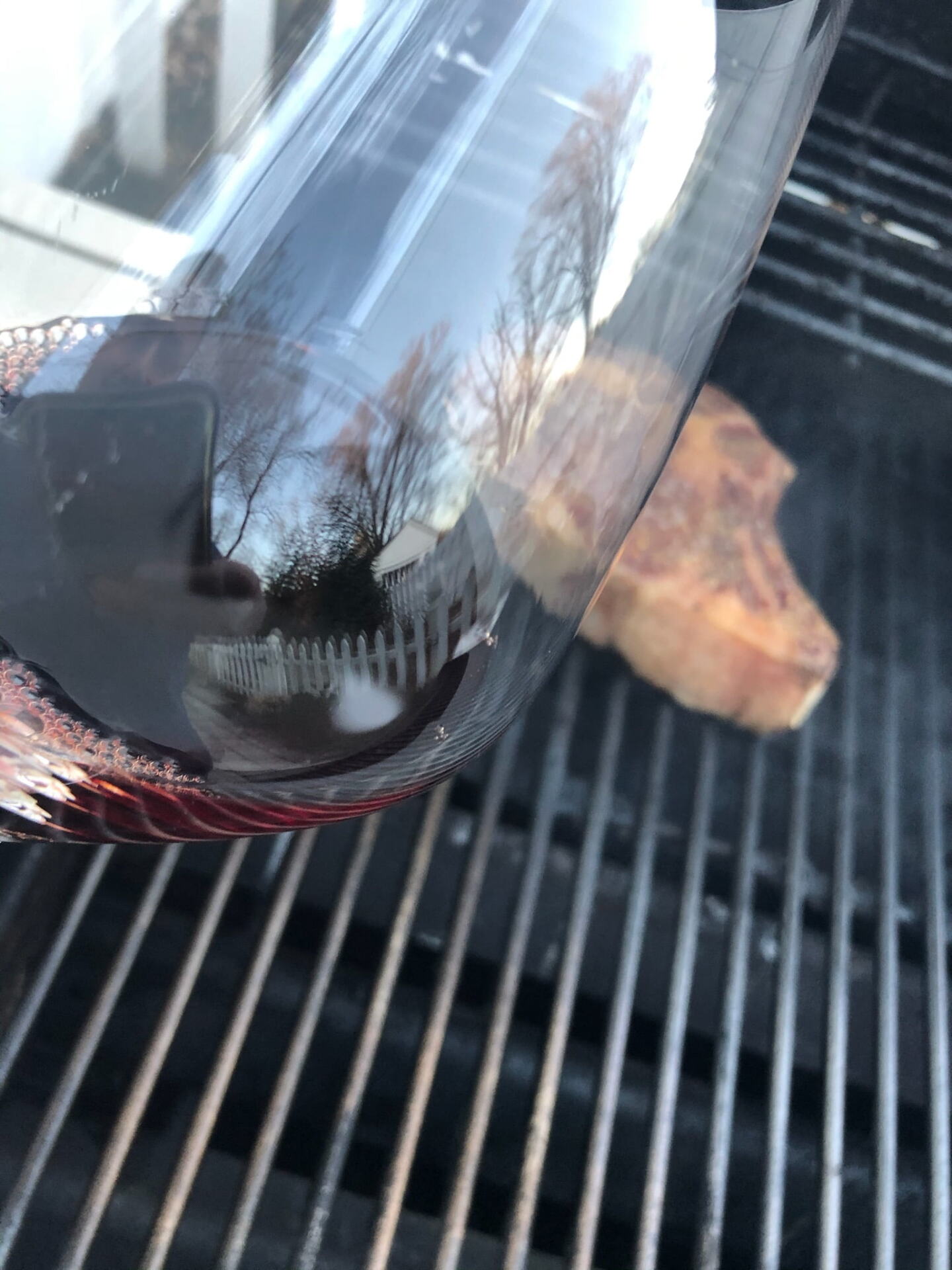 Baricci Brunello and Ribeye steak on the grill